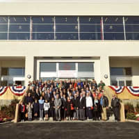 <p>All attendees—including NYAC Officers, Governors, Board of Governors and Standing Committees—pose outside the new Field House.</p>