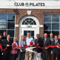 <p>Scott and Nina Ackerman (owners) with Darien local officials, Chamber Board of Directors and Club Pilates staff at the ribbon cutting</p>