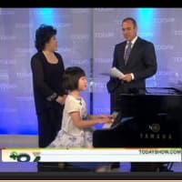 <p>Clara Tu, now 16, performed at Carnegie Hall more than 16 times. Here she is shown with her mother Felicia Zhang in an appearance on The Today Show at age six.</p>