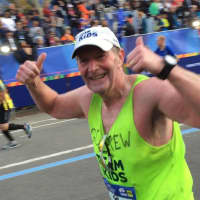 <p>Drew Swiss running the 2015 New York City Marathon.</p>
