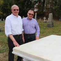 <p>Historical Society president Robert Murphy and Mayor Randy Casale admire that newly restored grave marker of American jurist James Kent at St. Luke’s Cemetery in Beacon.</p>