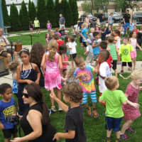 <p>Kids dance the night away during the Suffern Concert Series.</p>