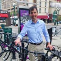 <p>New Rochelle Mayor Noam Bramson on the first day of the bike share.</p>
