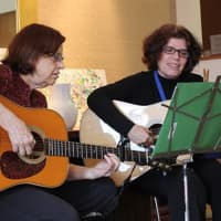 <p>Rita Deutsch, LCSW (right), a PROS senior recovery counselor, and her singing partner Anne Price performed a musical demonstration for PROS clients to help launch the new music program.</p>