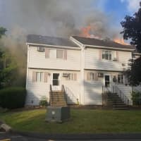 <p>Two residents suffered from smoke inhalation during a three-alarm fire.</p>