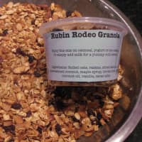<p>Susan Rubin packages her granola for teacher gifts.</p>