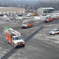 <p>Mutual aid crews from Orange and Rockland Utilities leave Central Hudson’s Kingston district office to assist in restoration efforts.</p>