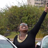 <p>Brianna McCoy reacts with excitement as she receives the keys to a car.</p>
