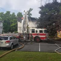 <p>Danbury firefighters wrap up following a three-alarm fire.</p>