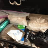 <p>Some of the heroin and packing seized during the bust.</p>