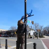 <p>Lamp posts across the downtown will have blue ribbons</p>