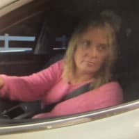 <p>Suffolk County Police investigators are attempting to locate a woman who stole credit and debit cards and attempted to use them at a bank in Commack.</p>