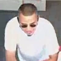 <p>Two men are wanted by Suffolk County Police after using stolen credit cards at five Huntington Station stores.</p>