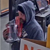 <p>A man is wanted after allegedly using a stolen credit card at multiple Long Island stores.</p>