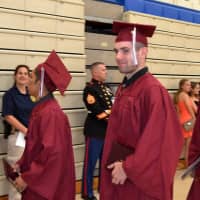 <p>Happy grads receive their diplomas at Valhalla High School&#x27;s commencement exercises Saturday.</p>