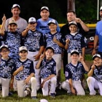 <p>Former Warrior standout Mark DeMenna (far right) is holding a Spring Training baseball camp next month.</p>