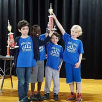 <p>Members of Ward Checkmates celebrate their wins in a recent scholastic contest at the William B. Ward Elementary School in New Rochelle. They are, from left: Paolo Kaprelian, Daniel Raff Cohen, Nathan Greenberg, and Gabriel Kramer-Griffith.</p>