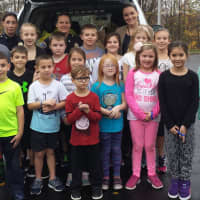 <p>Students from the Washington and George schools with Bergen Sheriff&#x27;s Officers Aime Mehnert and Sonya Bekier</p>