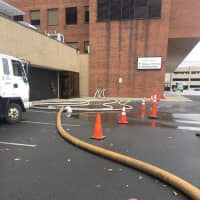 <p>Danbury firefighters set up a temporary hydrant at the hospital.</p>
