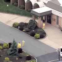 <p>NBC&#x27;s Chopper 4 got an aerial shot of people in heavy protective gear preparing the buses at St. Joseph’s Senior Home in Woodbridge last week.</p>