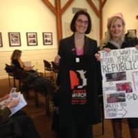 <p>Lisa Boyne, right, meets with state Rep. Cristin McCarthy Vahey at a League of Women Voters meeting.</p>