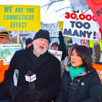 <p>The Rev. John T. Morehouse of the Westport Unitarian Church speaks at the rally to end gun violence in Newtown.</p>