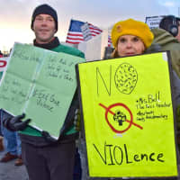 <p>About 40 people from Westport Unitarian Church turn out for Sunday&#x27;s rally at the National Shooting Sports Foundation headquarters in Newtown.</p>