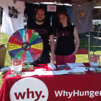 <p>Two representatives from WhyHunger promote their cause of, &quot;food justice,&quot; at the festival.</p>