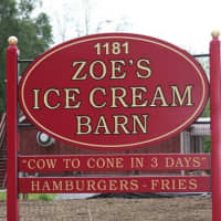 <p>Zoe&#x27;s&#x27; barn-red sign sports the ice cream shop&#x27;s motto -- from &quot;cow to cone in 3 days.&quot; The burgers and fries are coming this fall, say the shop&#x27;s owners.</p>