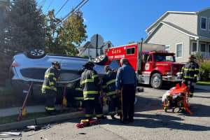 Police: Driver Runs Stop Sign, Knocks Over SUV In Hasbrouck Heights