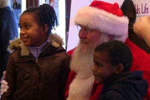 Santa Visits Peekskill Kids, Gives Away 600 Toys At Paramount