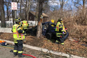 Firefighters Free Driver After Sedan Slams Into Tree Entering Route 17
