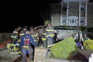 Upper Darby Driver Rescued After Car Rolls Over Onto Funeral Home Front Lawn