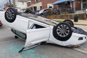 Car Overturns After Striking Parked Car In Delaware County