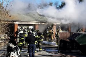 PHOTOS: Wayne Firefighters Douse Condo Garage Row Fire