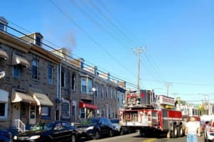 Firefighters Battle Rowhouse Blaze In Reading