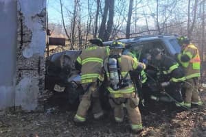 Firefighters Extricate SUV Driver In Teaneck Bridge Crash