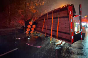 Tractor-Trailer Rollover Crash Backs Up I-95, Dumps Pipe On Roadway