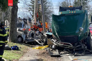 UPDATE: Two Airlifted After Minivan Slams Into Garbage Truck In Closter