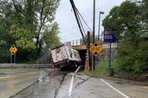 Delco Road Reopens After Truck Gets Stuck Under Bridge