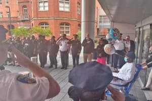 Baltimore Police Department Salutes Officer Released From Hospital After Being Shot
