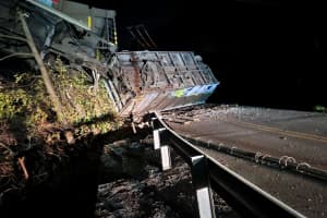 PHOTOS: Train Dangles Off Bridge Following Derailment In Central Pennsylvania