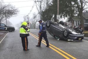 Driver Climbs Out After Rollover Crash In Wayne