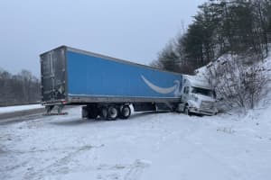Jackknifed Tractor-Trailer Spills Fuel On Snow-Covered I-84 Stretch