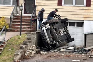 WILD ONE: Jeep Hits Three Homes, Rolls, Lands Sideways, Driver Survives: Hasbrouck Heights PD