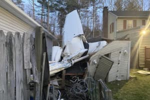 Small Plane Clips Roof Of CT Home, Crashes Into Shed