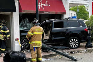 Driver Extricated, Hospitalized After SUV Slams Into Downtown Ramsey Jewelry Store