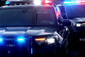 FIERY CRASH: Pole Lands On Officer's Vehicle, Stolen Sedan Occupants Flee