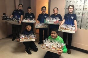 Englewood Soccer Club Youngsters Bring Holiday Cheer to City Elderly