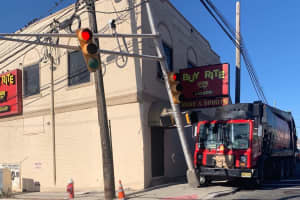 Garbage Truck Nearly Takes Out Traffic Light At Busy Fairview Intersection